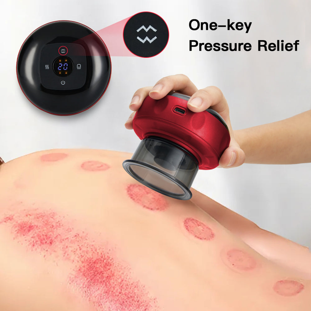 Red at-home cellulite therapy massager being used on a back with visible suction marks