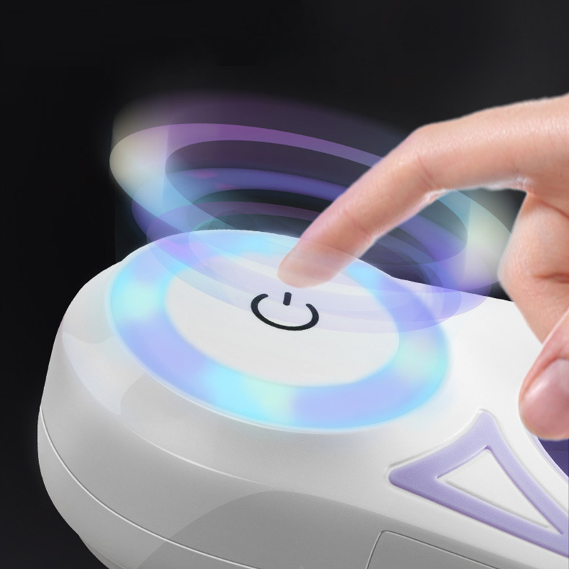 Person pressing power button on the best LED leash for walking dogs at night with glowing blue light