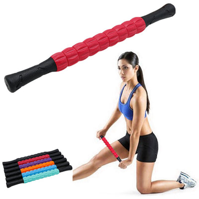 Red deep tissue massage roller with ergonomic handles shown with woman using it on leg muscles