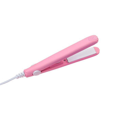 Pink mini ceramic hair straightener with white plates and power cord for portable styling