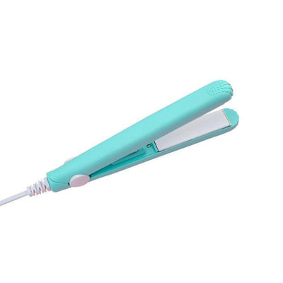 Turquoise mini ceramic hair straightener with white plates and power cord for travel and styling