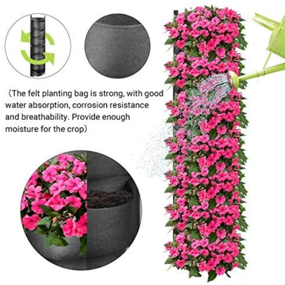 Vertical garden wall planter with pink flowers and the watering feature showing felt planting bag details
