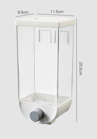 Clear plastic wall mounted grain dispenser with white top and gray knob measuring 25.5 cm tall