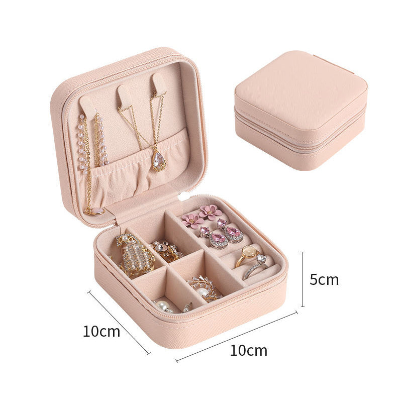 Compact pink Jewelry Zipper Box Storage with multiple compartments for necklaces rings and earrings