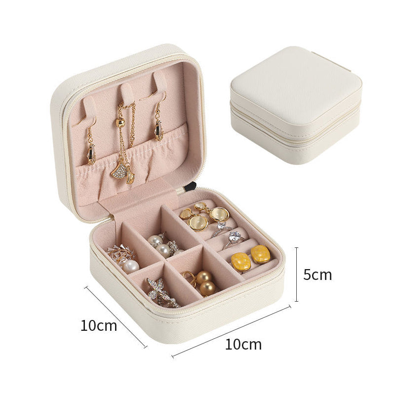 Compact Jewelry Zipper Box Storage with multiple compartments for earrings rings and necklaces in beige