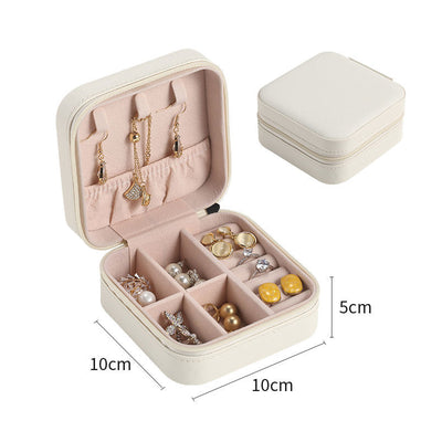 Compact Jewelry Zipper Box Storage with multiple compartments for earrings rings and necklaces in beige