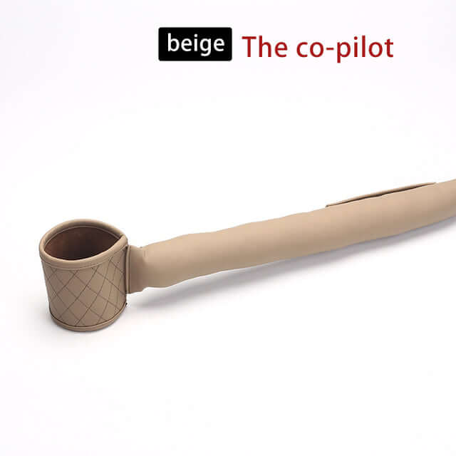 Beige leather car seat gap filler with cup holder to prevent items from falling between seats
