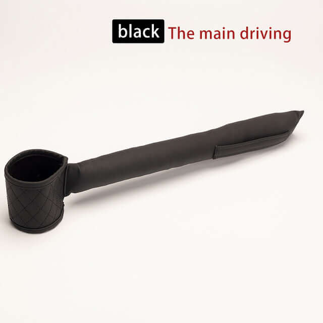 Black leather car seat gap filler designed to prevent items from falling between car seats