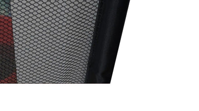 Close-up view of a black mesh portable pet safety gate designed for easy pet containment