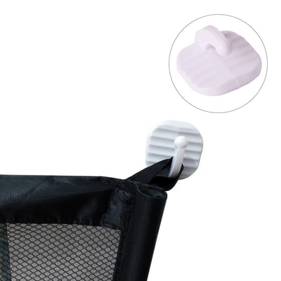 Close-up of portable pet safety gate attachment hook securing black mesh gate fabric