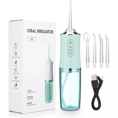 Waterproof dental irrigator with four interchangeable nozzles and USB charging cable for oral care