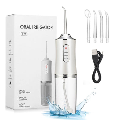 Waterproof dental irrigator with multiple nozzles USB charger and white sleek design for oral care