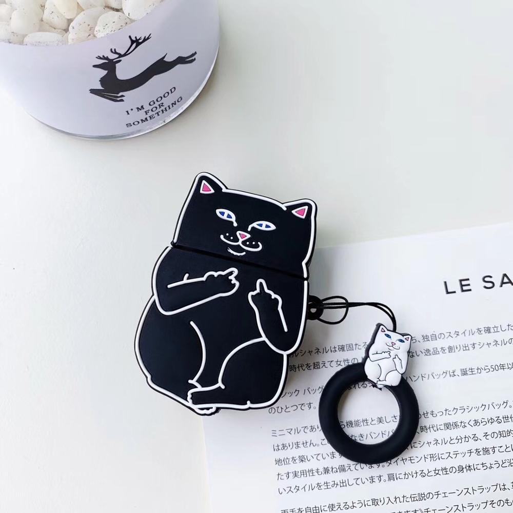 Black cartoon cat AirPods case with playful design and keyring attached on white surface